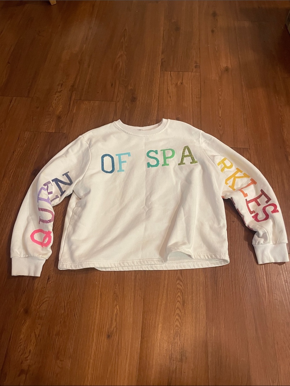 QUEEN OF SPARKLES White Crewneck Sweatshirt with Rainbow Lettering